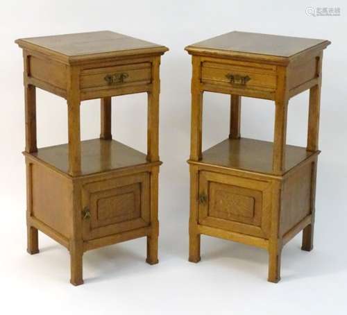 A pair of late 19thC oak Gothic bedside cabinets / night stands with crossbanded tops,