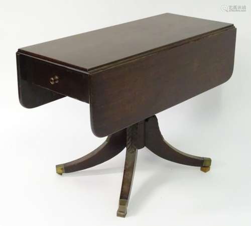 A mid / late 19thC mahogany pembroke table with a rectangular top above a single end drawer,