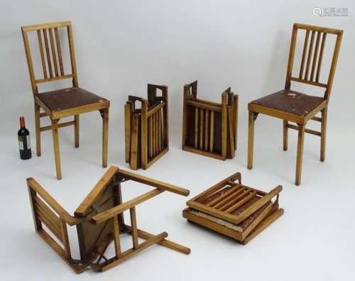 A set of six American ‘Leg-o-matic’ folding chairs,