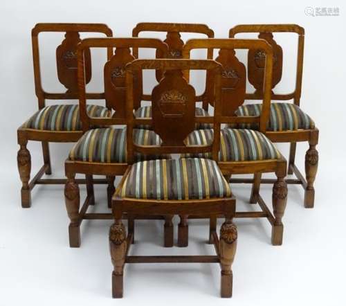 A set of six early / mid 20thC oak dining chairs,