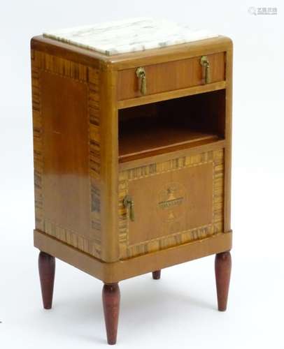 An early / mid 20thC mahogany bedside cabinet with an inset marble top above a single short drawer