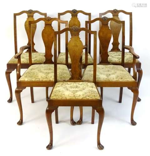 A set of six (4+2) early / mid 20thC dining chairs with shaped carved cresting rails,