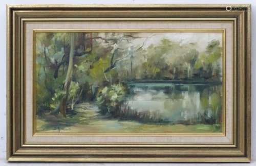 B Manus, XX, Oil on board, A wooded lake, Signed lower left.