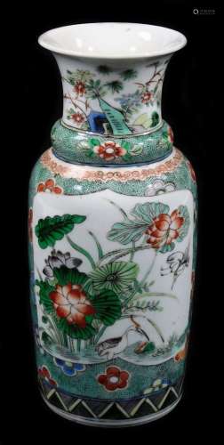 A Chinese porcelain famille vert baluster vase, decorated with panels of hollyhock and watery