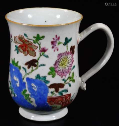 An 18thC Chinese porcelain baluster tankard, polychrome decorated with a hollyhock pattern