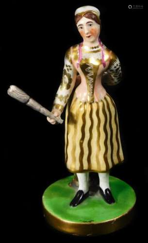 A Chamberlain Worcester figure of Madame Vestry with her broom, the figure standing on a circular