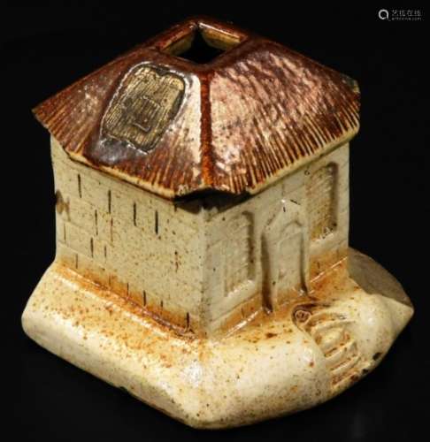 A early 19thC stoneware cottage group, probably Brampton, in two colours, with open top on shaped