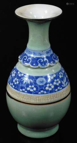 A 19thC Chinese porcelain celadon vase, with blue highlights, trumpet stem, bulbous body and a