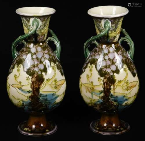 A pair of late 19thC Minton's Secessionist pottery vases, in the manner of Louis Solon, of