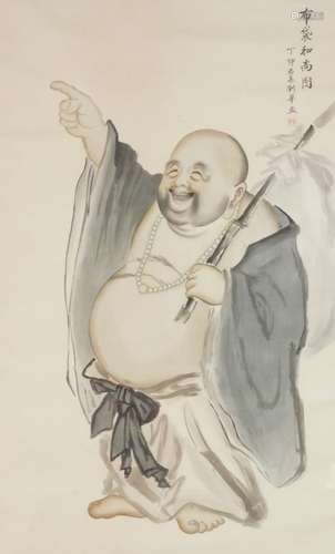 Chinese School. Figure of Buddha standing holding bamboo and pointing, mixed media wash on a silk