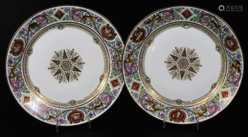 A pair of Sevres porcelain Chateau De Fontainbleau plates, of circular form with armorial crests,