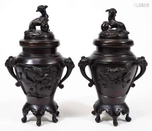 A pair of Japanese Meiji period bronze koro with covers, of small proportion, each pierced lid