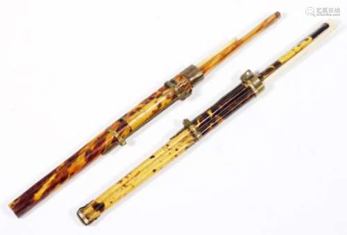 A pair of early 20thC chopstick sets, each in tortoiseshell decorated bamboo style sheaths, 29cm