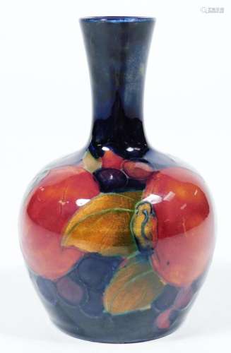A William Moorcroft pomegranate vase, impressed Moorcroft Made in England 2A, 10cm H.