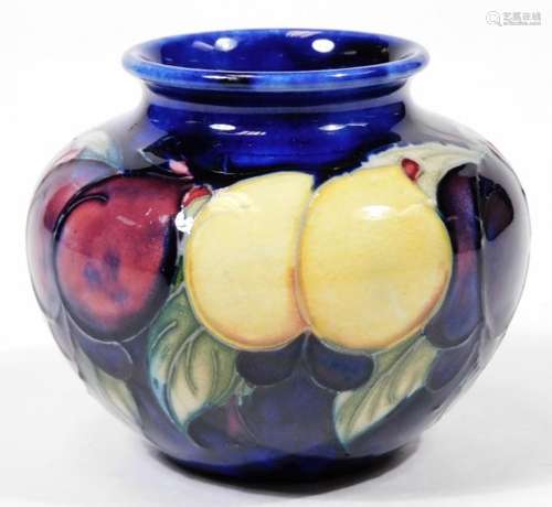 An early 20thC William Moorcroft Wisteria pottery vase M55/3, c1920, impressed mark, 7cm H.