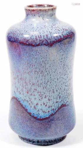 A 20thC Moorcroft pottery Cobridge test vase, the waisted shaped vase decorated in a mottled blue