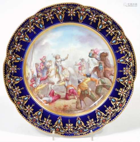 An early 19thC jewelled Sevres porcelain plate, painted with a classical battle scene, double