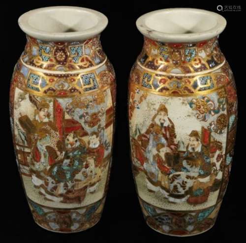 A pair of Meiji period Japanese pottery Satsuma vases, each of shouldered form, profusely