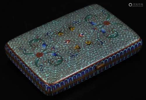 A 20thC Chinese cloisonné box, of oblong form with thumb mould handle, profusely decorated with