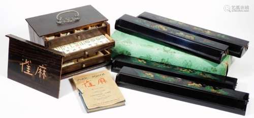 An early 20thC bone and ivory Mahjong set, in a stained hardwood box of rectangular form, with