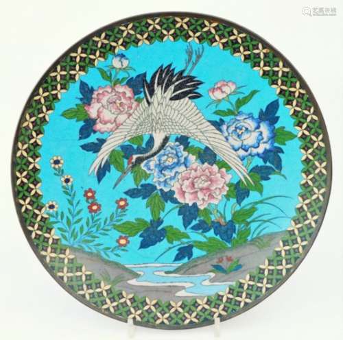 An early 20thC Japanese Meiji period cloisonné enamel plate, of circular form, decorated with Kutani