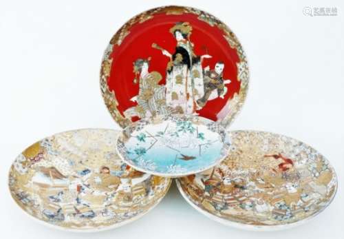 A pair of 19thC Japanese Meiji period Satsuma dishes, of circular form, profusely decorated with