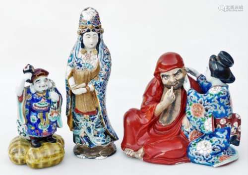 Three various early 20thC porcelain figures, comprising a standing Chinese lady holding scroll,