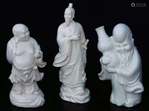 Various Chinese blanc de chine figures, comprising of a bearded sage in flowing robes, another