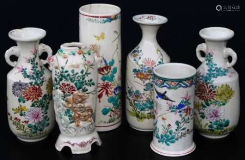Various Japanese Meiji period pottery vases, to include a cylindrical stem vase, with an upper