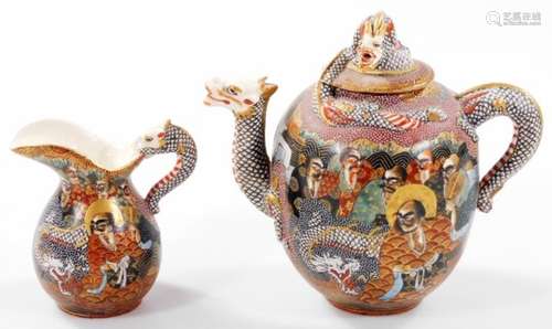 A Japanese Meiji period Satsuma pottery two piece tea service, comprising teapot with domed dragon