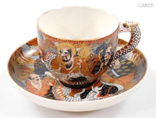 A Japanese Meiji period Satsuma pottery tea cup and saucer, 11cm Dia. each profusely decorated