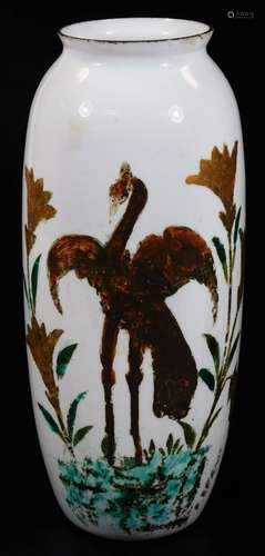 An early 20thC Japanese design glass vase, decorated with an exotic bird and flowers,