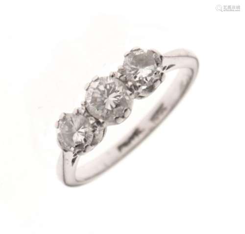 White metal and three stone diamond ring, shank stamped PLAT 18ct, size O, 3.9g gross approx