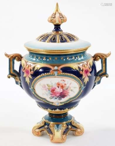 An early 20thC Hadleys Worcester porcelain potpourri vase and cover, the squat circular body