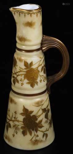 A 19thC blush ivory style glass ewer, of tapering circular form, gilt highlighted with flowers, with