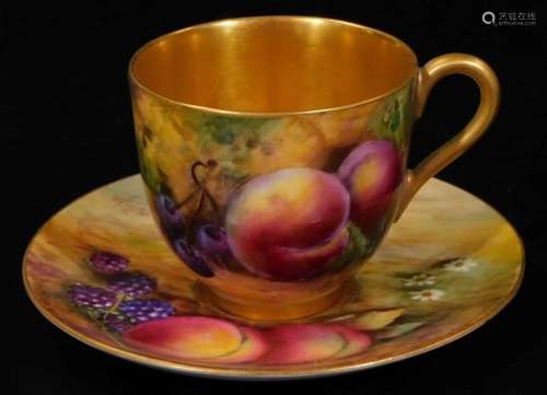 A 20thC Royal Worcester porcelain fruit pattern cup and saucer, 1921, by Harry Price, handpainted