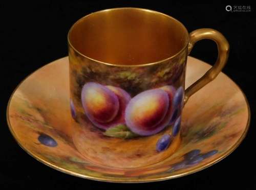 A 20thC Royal Worcester coffee can and saucer, 1923, by Ernest Barker, each decorated with