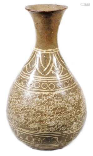 A Korean type pottery Buncheong design vase, stamped with a repeat floral pattern with an upper