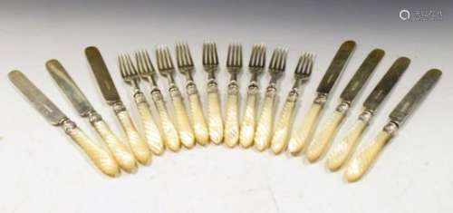 Victorian set of silver and mother-of-pearl handled cutlery featuring nine dessert forks and seven