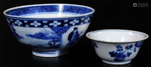 A Chinese porcelain tea bowl, of circular tapering form, decorated with flowers, with double line