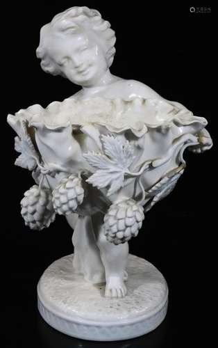 A late 19thC Copeland Spode figure, of a child holding a fruit basket, of shaped form on a