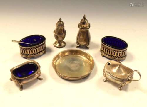 Collection of silver items to include; a three piece George V silver condiment set, Birmingham 1924,