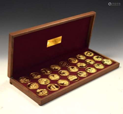 Collection of twenty-four silver gilt medallions issued by The Danbury Mint commemorating the Life
