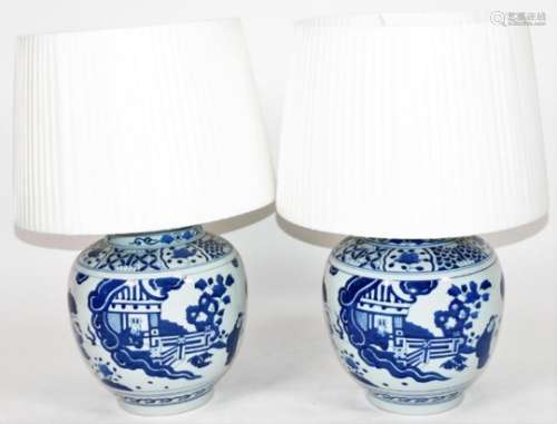 Two Qing style blue and white Chinese porcelain lamp vases, of large proportion, with fixed lids,