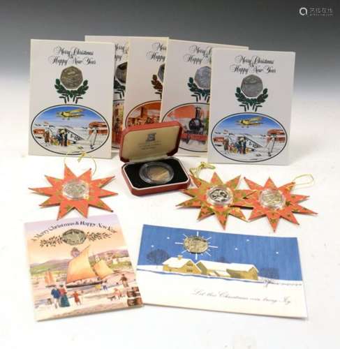 Coins - Small collection of Isle of Man Christmas 50 pence pieces (50p) in presentation cards etc