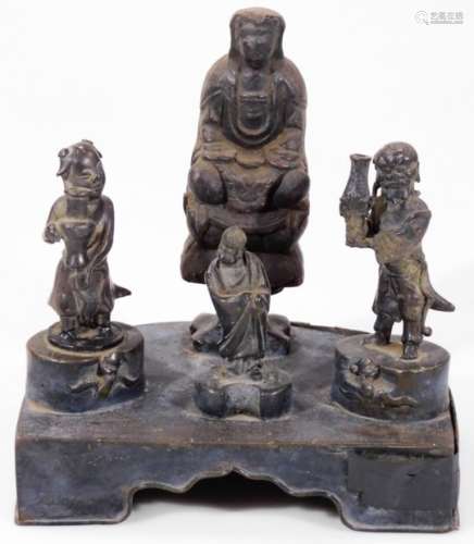 A 19thC figure group stand, formed as three various cast bronze figures, attached to a shaped