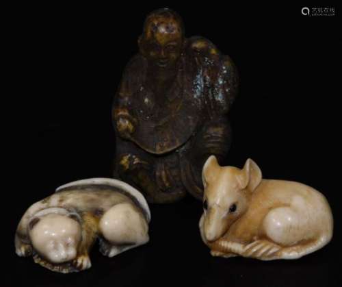 Two early 20thC Japanese netsuke, comprising a sleeping cat and a mouse and a further similar figure