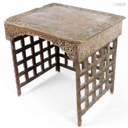 An unusual 19thC Chinese folding table, the square top heavily carved with various motifs, with