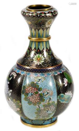 A Chinese Qing period cloisonné vase, of floral form with cylindrical stem, profusely decorated with