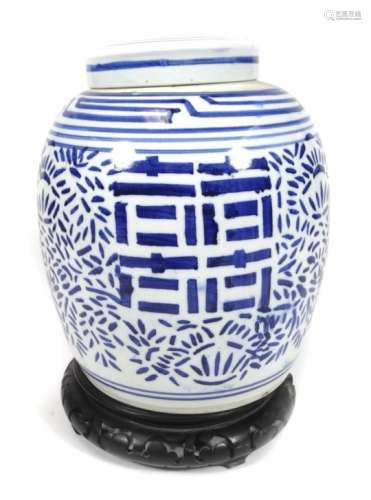 A Chinese pottery Ming style jar and cover, in a geometric pattern with upper Greek key style